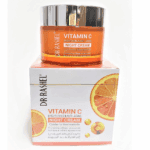 Dr. Rashel Vitamin C Brightening Face Night Cream 50g in an orange glass jar with a shiny silver lid, placed on its matching box featuring citrus graphics, highlighting its brightening and anti-aging formula with niacinamide.