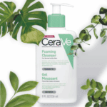 CeraVe Foaming Cleanser bottle styled with green leaves on a clean white background