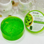 Top view of Dr. Rashel Aloe Vera gel with lid removed, highlighting smooth translucent green gel consistency