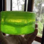 Side view of Dr. Rashel Aloe Vera Soothing and Moisturizing Gel jar showing clear green container and gel inside