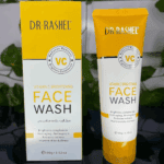 Dr. Rashel Vitamin C brightening face wash box and tube standing upright with green plant background
