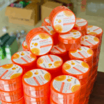 Multiple Dr. Rashel Vitamin C Soothing Gel 99% jars stacked together showing bulk stock packaging in store