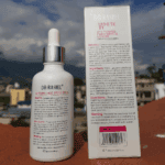 Back view of Dr. Rashel Whitening Fade Spots Serum bottle and box showing ingredients, directions, and product details.