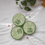 Flat lay view of Roushun Aloe Vera 99% soothing moisturizing gel tubs arranged on a white background with green leaves.