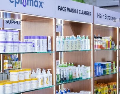 Store shelves stocked with Epimax, CeraVe, and various skincare and hair care products.