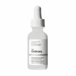 The Ordinary Niacinamide 10% + Zinc 1% serum in frosted glass dropper bottle on a white background