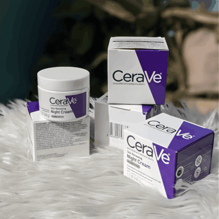CeraVe Skin Renewing Night Cream jar displayed with multiple product boxes on a soft surface