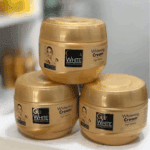 Multiple Gluta White whitening cream jars stacked together showing glutathione collagen skincare packaging
