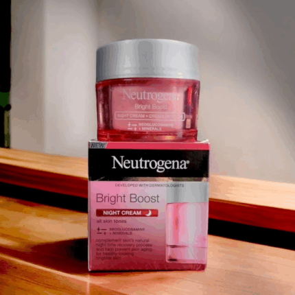 Neutrogena Bright Boost Night Cream placed on top of original box packaging highlighting night cream for all skin tones