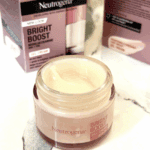 Open Neutrogena Bright Boost gel cream jar showing smooth cream texture inside
