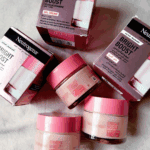Neutrogena Bright Boost gel cream jar with matching box on reflective surface