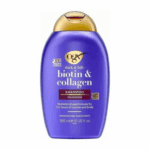 OGX Thick and Full Biotin and Collagen Shampoo bottle showing purple packaging with gold cap on a white background