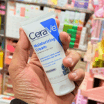 CeraVe Moisturizing Cream 56ml travel size tube held in hand for normal to dry skin