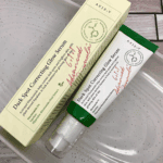 AXIS-Y Dark Spot Correcting Glow Serum 50ml tube and box laid flat showing product details