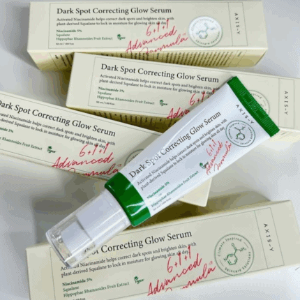 Multiple AXIS-Y Dark Spot Correcting Glow Serum boxes with serum tube highlighting advanced formula