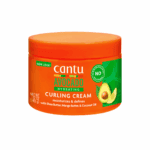 Cantu avocado hydrating curling cream jar with orange lid and avocado graphic