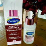 Cetaphil Healthy Radiance Brightening Serum 30ml bottle displayed next to its original packaging