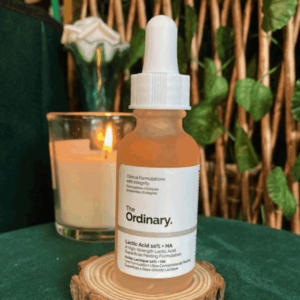 The Ordinary Lactic Acid 10% + HA 2% 30ml exfoliating serum bottle on wooden stand