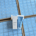 Medicube Zero Foam Cleanser 120g facial cleanser with box on blue product background.
