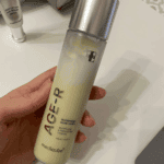 Medicube AGE-R Glutathione Glow Toner 140ml brightening toner bottle held in hand.