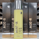 Bottle of Medicube AGE-R Glutathione Glow Toner (140 ml) with a silver cap, placed in front of several black Medicube AGE-R product boxes in a retail store setting.