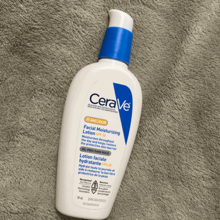 CeraVe AM Facial Moisturizing Lotion SPF 30 bottle with pump on a textured towel background.
