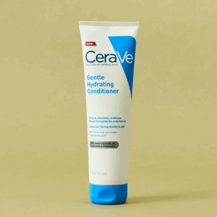 A tube of CeraVe Gentle Hydrating Conditioner with a white and blue design standing upright against a beige background, formulated with ceramides and hyaluronic acid to gently condition hair and support the scalp barrier.