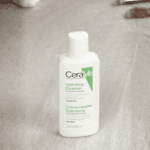 CeraVe Hydrating Facial Cleanser 88ml travel size bottle for normal to dry skin placed on a bathroom surface, gentle fragrance free face wash with ceramides.