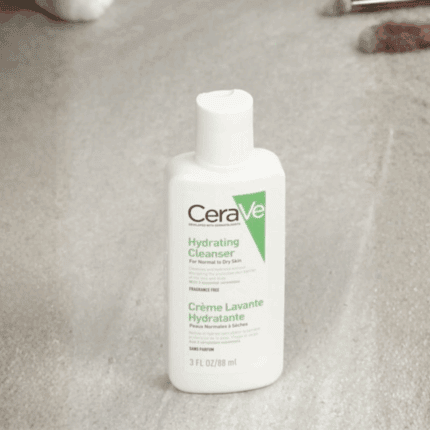 CeraVe Hydrating Facial Cleanser 88ml travel size bottle for normal to dry skin placed on a bathroom surface, gentle fragrance free face wash with ceramides.