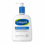 Large pump bottle of Cetaphil Oily Skin Cleanser 473ml for combination to oily sensitive skin, formulated with niacinamide and panthenol to gently cleanse and minimize pores without drying.
