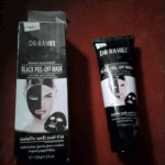 Dr. Rashel black peel-off charcoal mask showing box packaging and tube on a surface, used for blackhead removal and deep pore cleansing