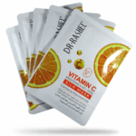 A set of Dr. Rashel Vitamin C Brightening and Anti-Aging Silk Mask sachets (5 pieces) featuring orange graphics, formulated with niacinamide to help brighten skin and reduce fine lines.