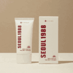 K-Secret Seoul 1988 Sun Pine Tree + Ceramide 50ml sunscreen tube displayed next to its box packaging on a neutral background.