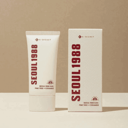 K-Secret Seoul 1988 Sun Pine Tree + Ceramide 50ml sunscreen tube displayed next to its box packaging on a neutral background.