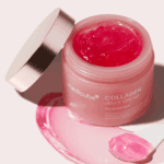 Open Medicube Collagen Jelly Cream showing bright pink jelly texture with skincare spatula.