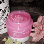 Medicube PDRN Pink Collagen Capsule Cream jar open showing pink collagen capsules in gel moisturizer.