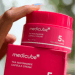 Medicube TXA Niacinamide Capsule Cream 5% brightening cream with box packaging.