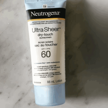 Neutrogena Ultra Sheer Dry-Touch Sunscreen SPF 60 88ml tube on marble surface